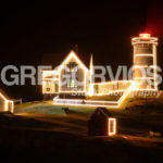 Nubble Lighthouse lit up at night